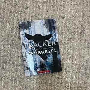 Scholastic Tracker by Gary Paulsen - Blue and Black Cover